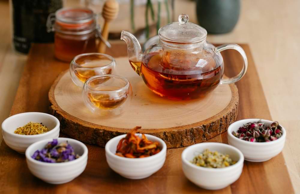 Ayurvedic treatment for gas acidity and bloating with herbal tea and natural ingredients