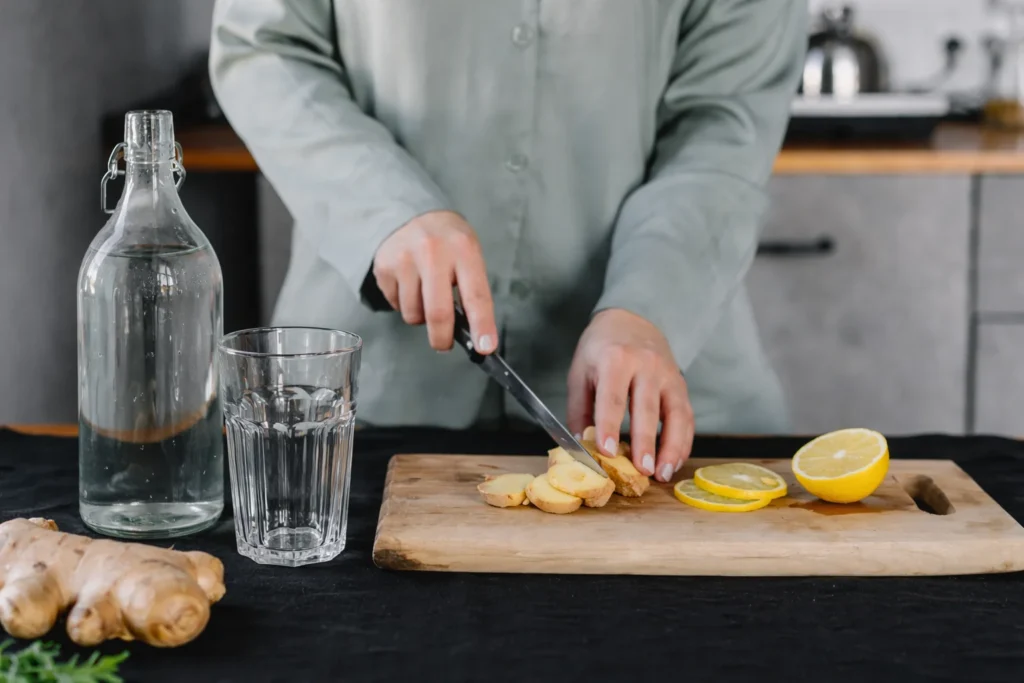 Ginger Water Benefits Preparing fresh ginger water at home.